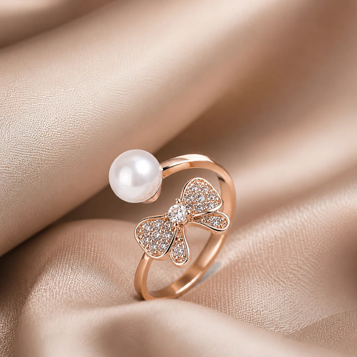 Aarnikaa Elegant Rose Gold Plated Pearl and Bow Crystal Adjustable Ring